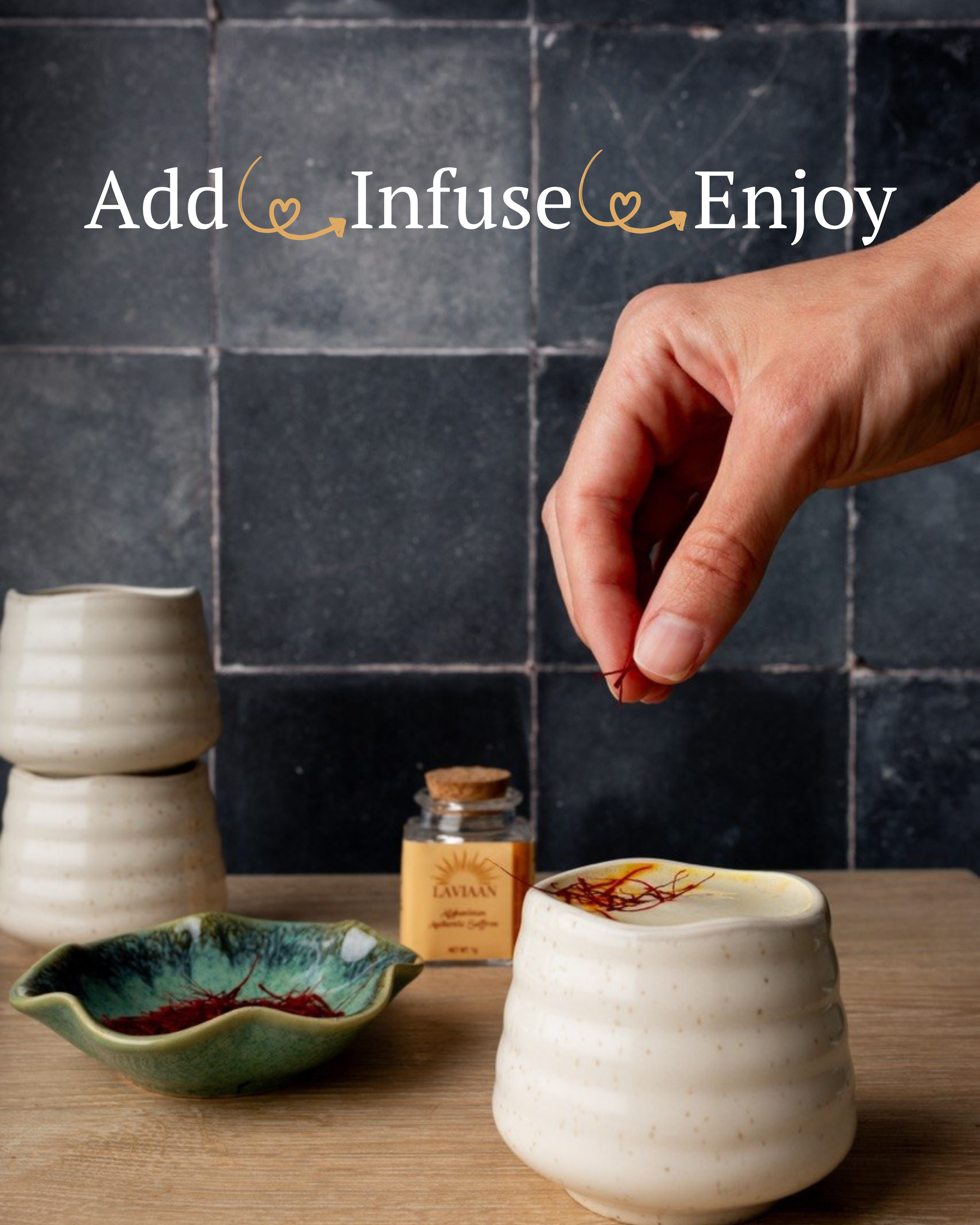 Hand reaching for a small jar on a wooden surface with text 'Add, Infuse, Enjoy' above.