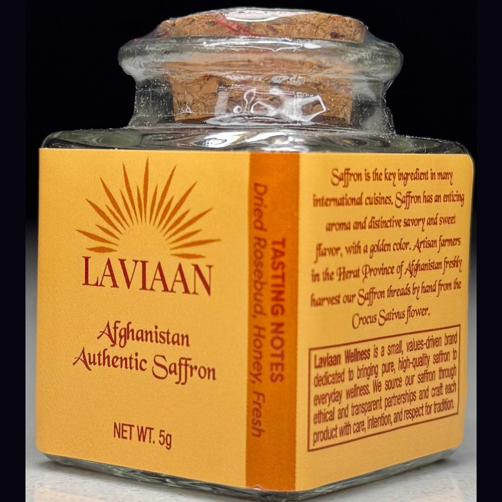 Laviaan Afghan saffron jar with orange label on a dark background